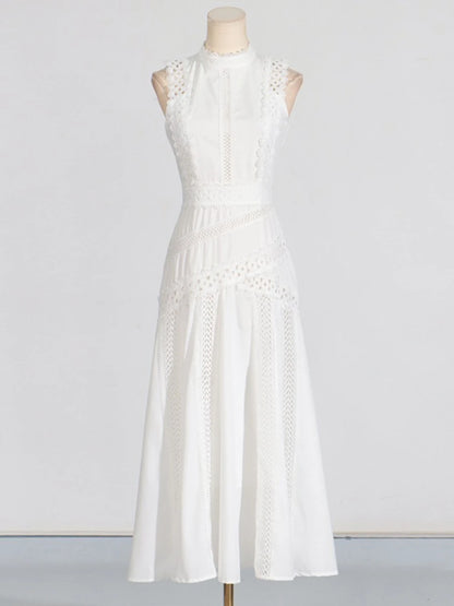 Ärmelloses Damen-Spitzenkleid mit Rundhalsausschnitt und Patchwork-Design – figurbetont und mit Hohldetails.