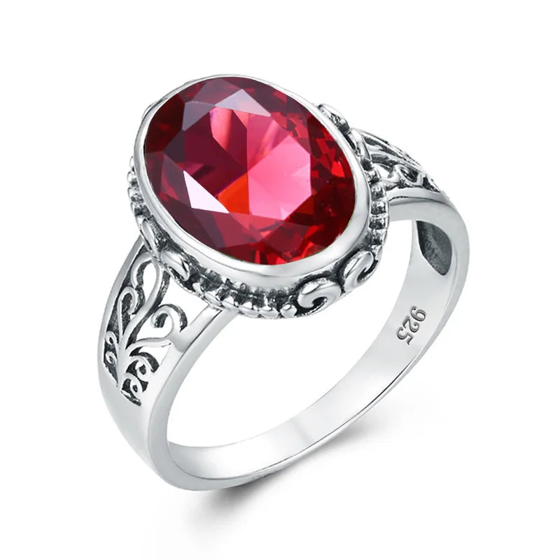 Damen-Ring aus Gold mit ovalem Granatstein 10x14 mm handgefertigtes Schmuckstück im markantem Design