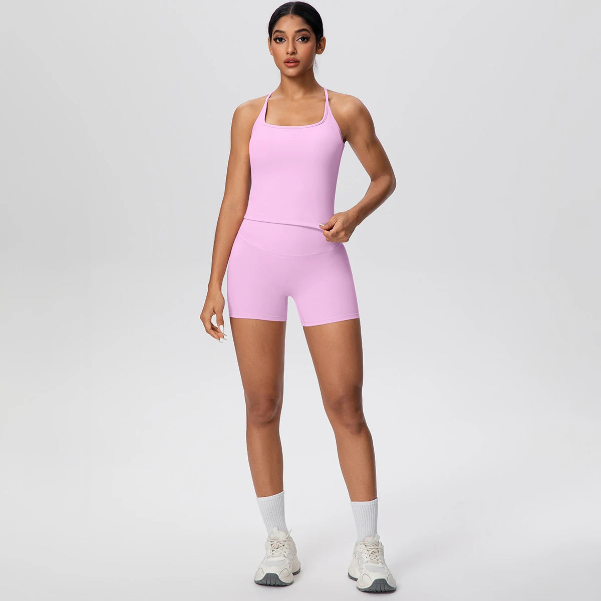Rosa Yoga-Set mit ärmelloser Weste und High-Waist-Shorts, gerade Passform