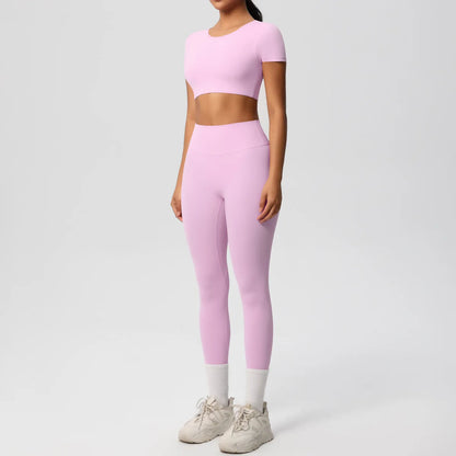 Yoga-Set für Damen: Crop-Top und High-Waist-Leggings, hellrosa, Frontansicht.