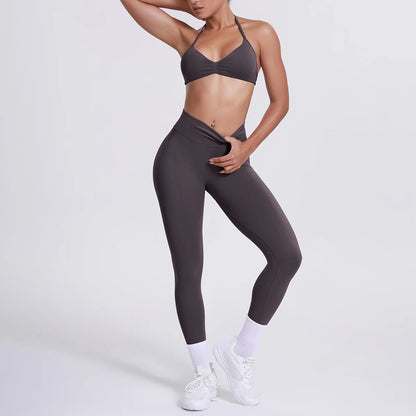 Schiefergraues Yoga-Set: Sport-BH und High-Waist 7/8-Leggings, figurbetont.