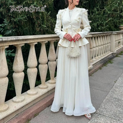 Elegantes Damenkleid mit Rundhalsausschnitt, halblangen Ärmeln und Spitzen-Patchwork-Design – figurbetont und stilvoll.