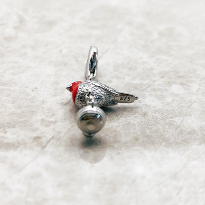 Vogel-Anhänger aus 925er Sterlingsilber mit rotem Flügel und runder Öse