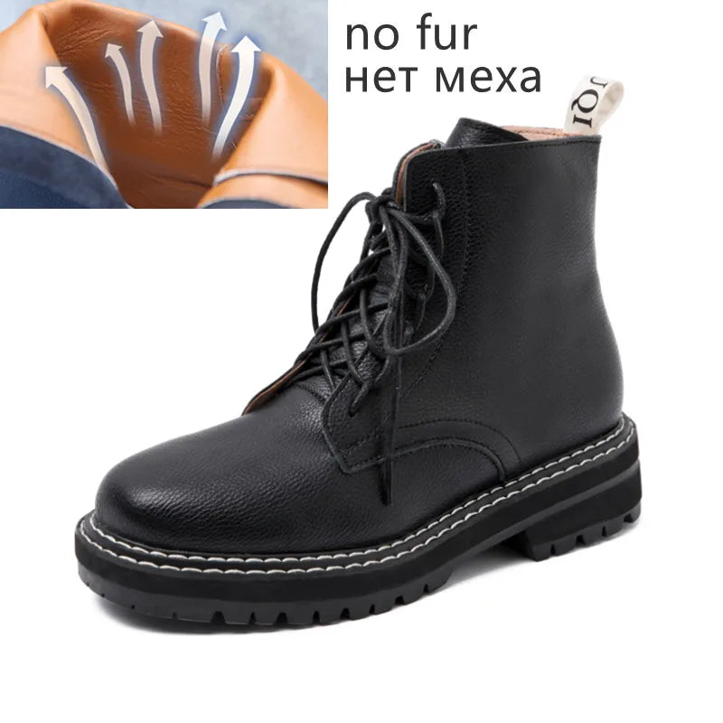 Schwarze knöchelhohe Schnürstiefelette mit dicker Profilsohle, robuste Lederrundung