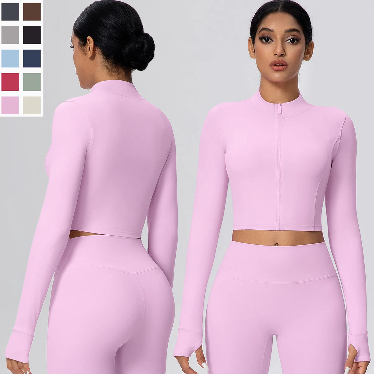 Sportliches Damen-Zipper-Top in Hellrosa mit Daumenlöchern, vorne Reißverschluss und Stehkragen