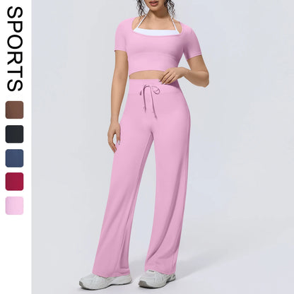 Rosa Yoga-Set: kurzes Top und weite Hose mit Kordelzugbund