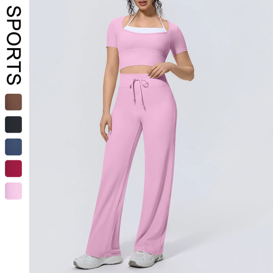 Rosa Yoga-Set: kurzes Top und weite Hose mit Kordelzugbund