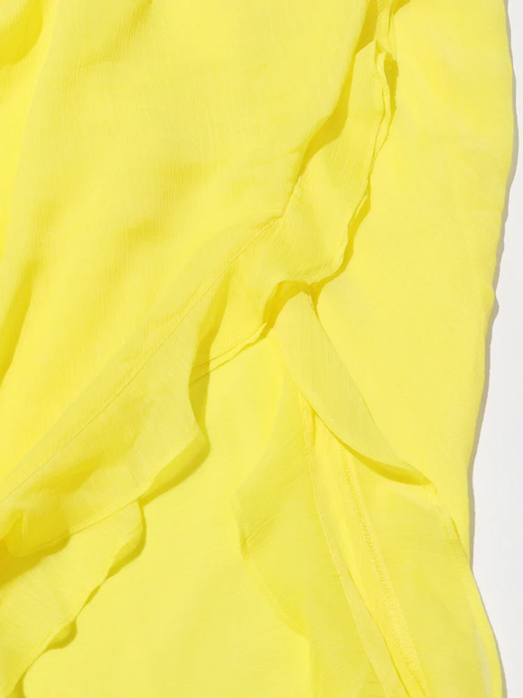Lässige Damenbluse mit Stehkragen und langen Ärmeln im Patchwork-Design – transparent und stilvoll.