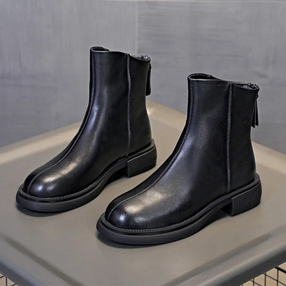 Schwarze Chelsea-Boots aus Leder mit seitlichem Einsatz und Blockabsatz