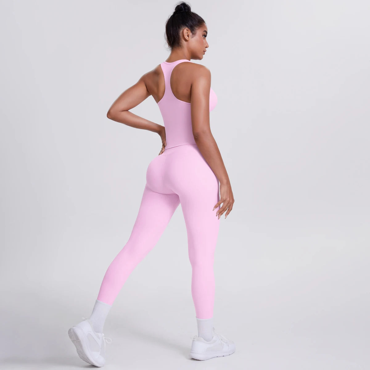 Damen Yoga-Set mit Trägertop und Leggings, einfarbig rosa, seitliche Ansicht