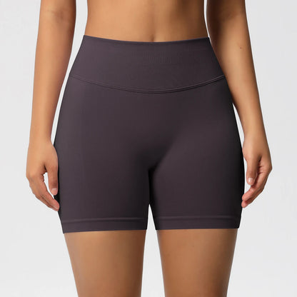 Damen-Yoga-Shorts High-Waist, dunkelviolett, figurbetont mit Nahtlinie am Bund