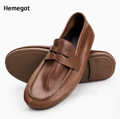 Herren-Loafer aus Leder, braun, Riemenverschluss am Rist, mit Profilsohle