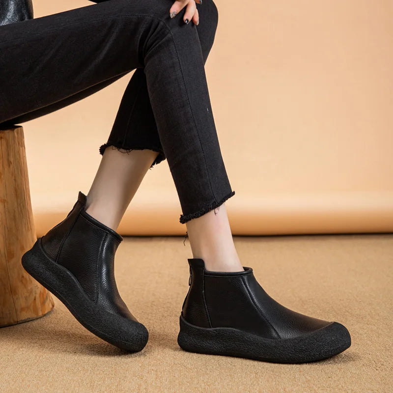 Schwarze Stiefeletten aus Leder mit kurzem Schaft, flacher Laufsohle