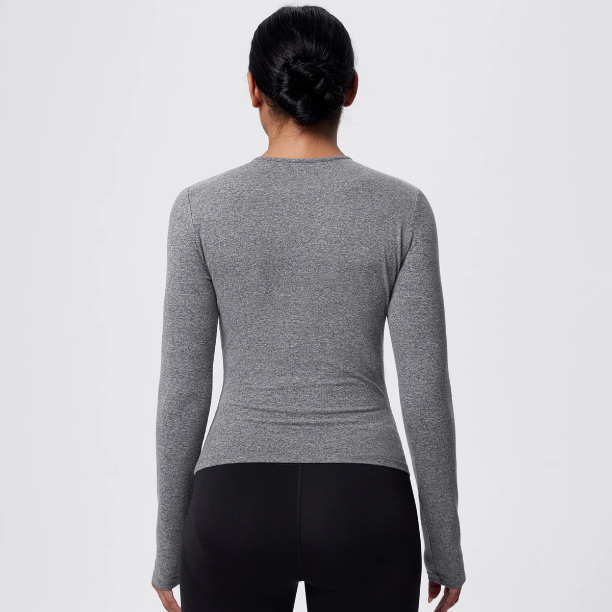 Damen-Langarmshirt für Yoga, grau meliert, Rückansicht mit langen Ärmeln