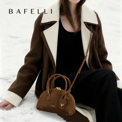 Bowlingtasche aus Echtleder in Terracotta-Braun mit kurzem Griff und Umhängeriemen