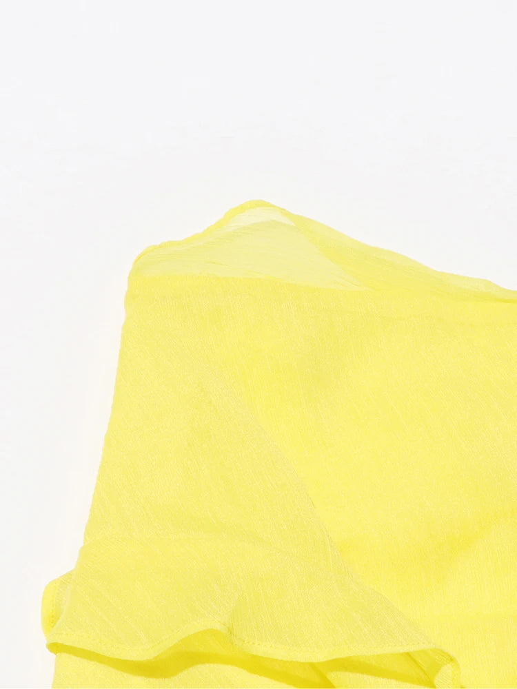 Lässige Damenbluse mit Stehkragen und langen Ärmeln im Patchwork-Design – transparent und stilvoll.