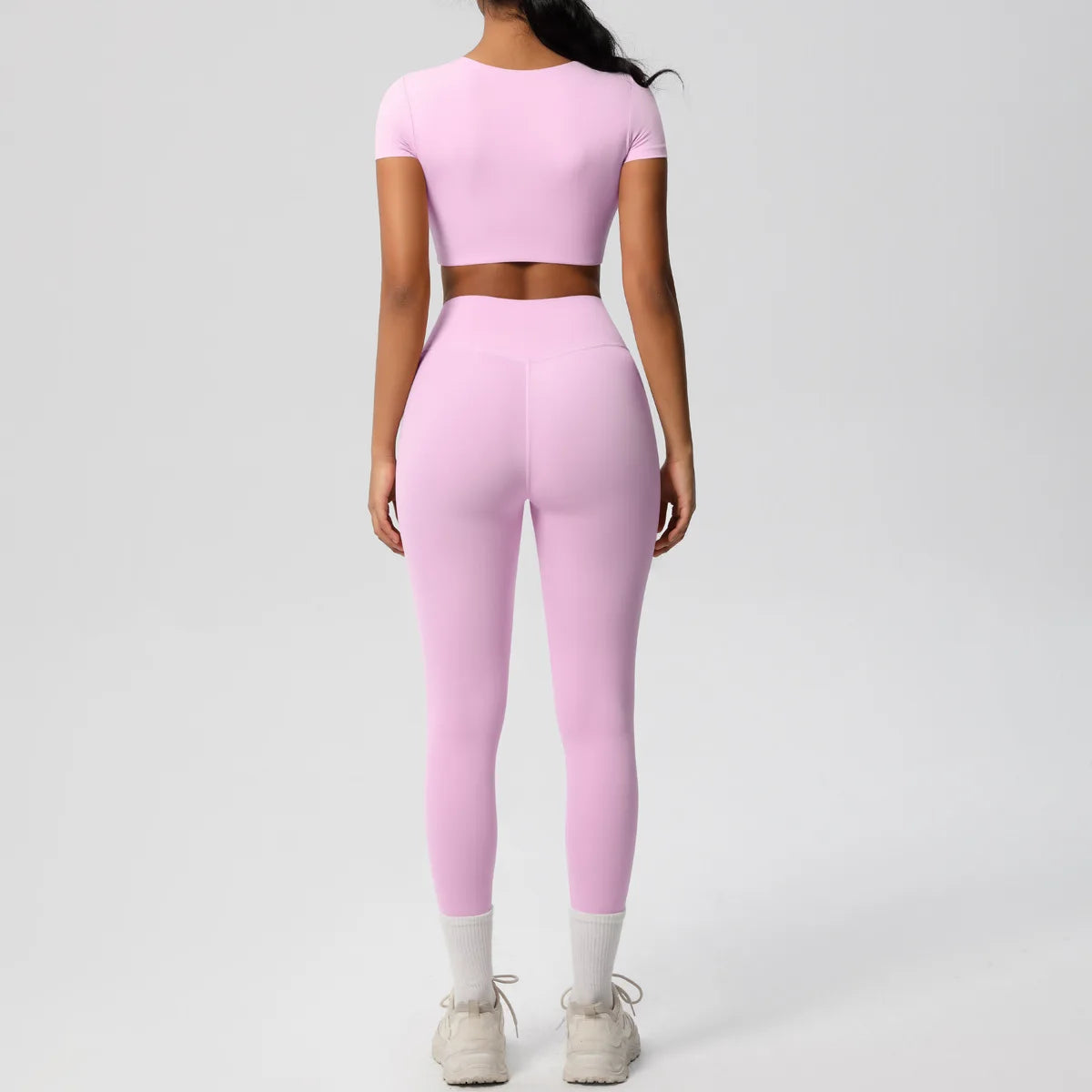 Yoga-Set für Damen: Crop-Top und High-Waist-Leggings, hellrosa, Rückenansicht komplett.