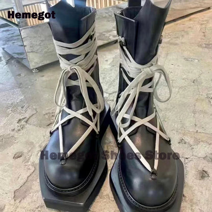 Zwei Herren-Schnürstiefeletten, hoher Schaft, runde Kappe, dicke Sohle, schwarze Optik, beige Schnürsenkel