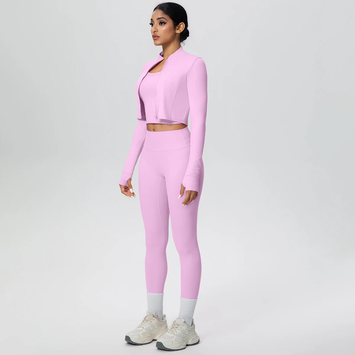 Rosa Yoga-Set mit Zip-Top und High-Waist-Leggings, schräger Blick