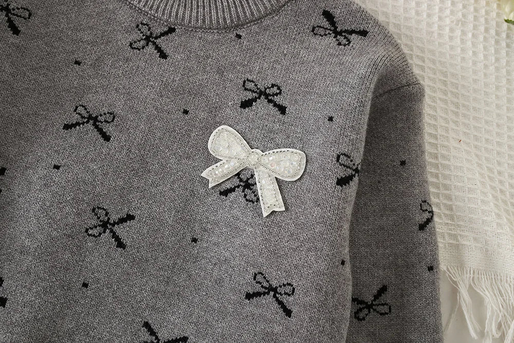 Mädchen Kleidungsset mit Bogen Druck Pullover und Faltenrock im 2-Teile Design