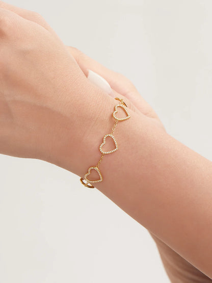 Damen-Charm-Armband mit Herzschleife und Zirkonia