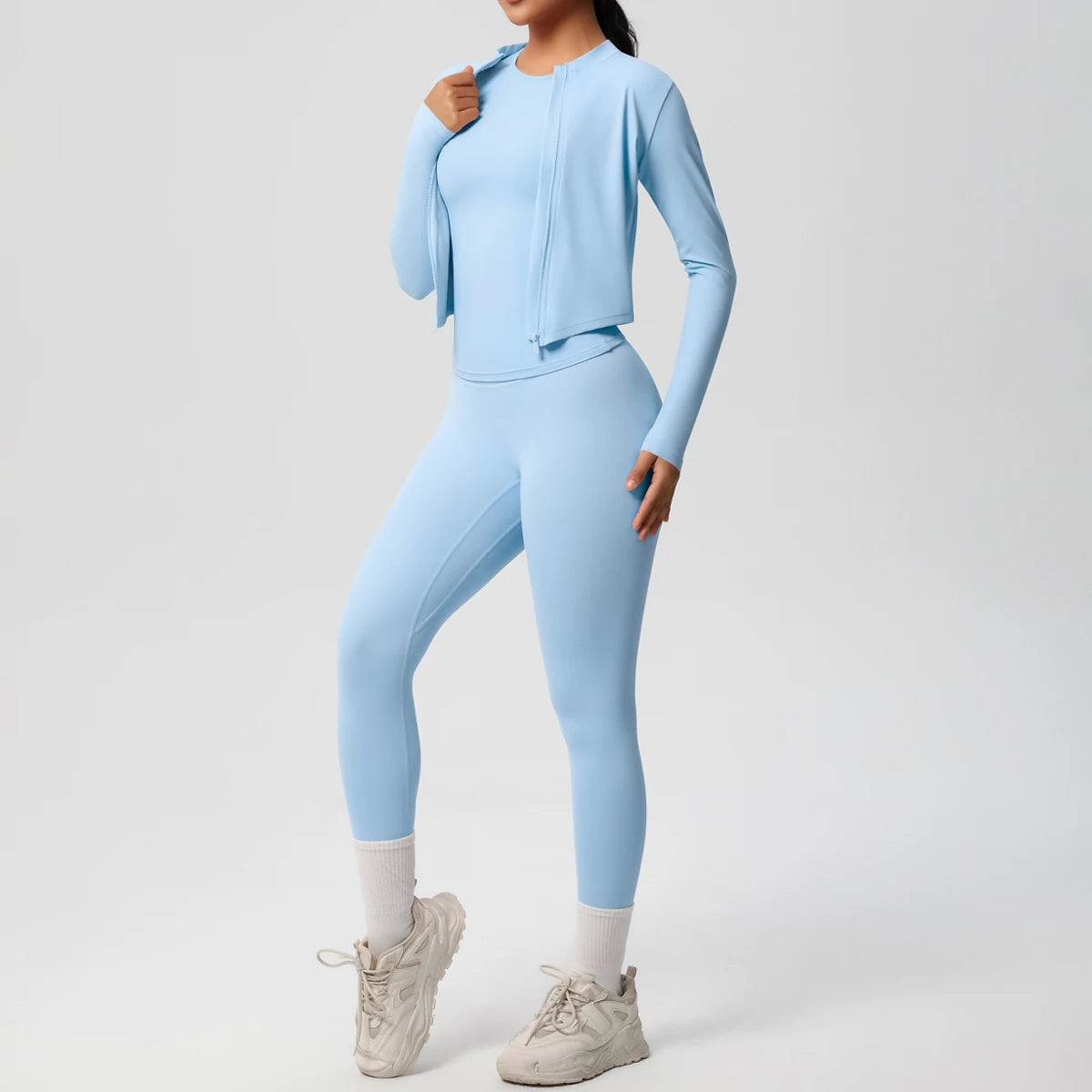Damen-Yoga-Set in Hellblau: High-Waist Leggings und langärmliges Top mit Reißverschluss