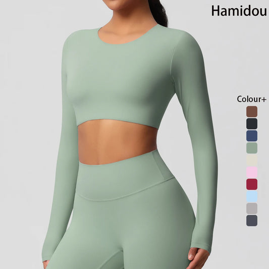 Damen Sportshirt mit Rundhalsausschnitt, langarm, kurz geschnitten, mintgrün