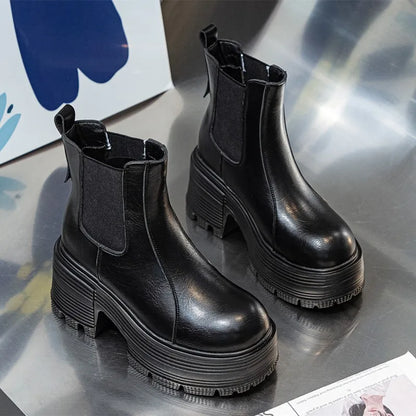 Schwarze Chelsea-Boots mit hohem Plateau-Absatz und geripptem Sohlenprofil