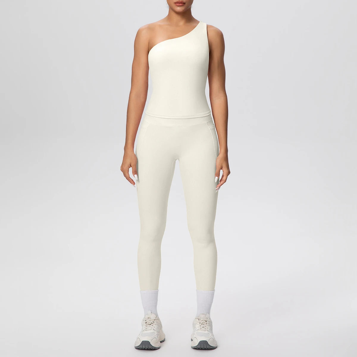 Yoga-Set aus ärmellosem Top und Leggings, helles Creme/Offwhite mit hellem Beinabschluss