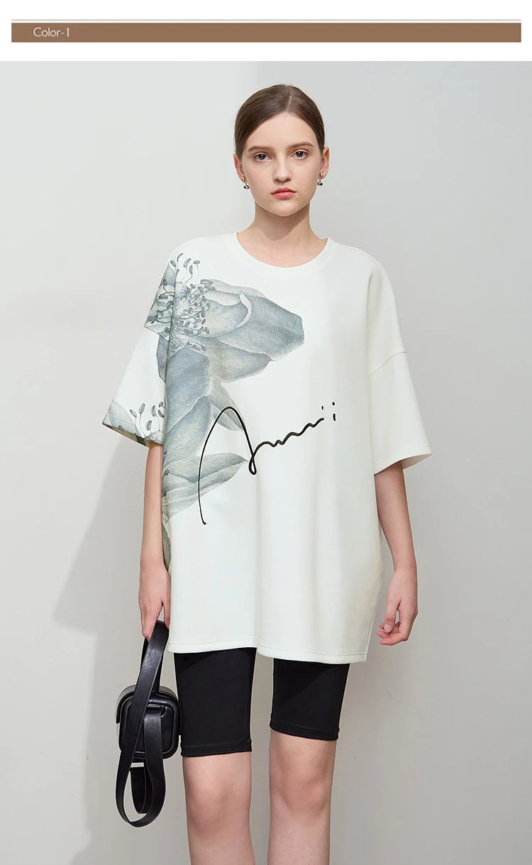Damen T-Shirt mit lockerem O-Ausschnitt und Blumenmuster sowie Stickerei
