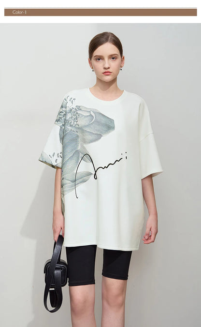 Damen T-Shirt mit lockerem O-Ausschnitt und Blumenmuster sowie Stickerei
