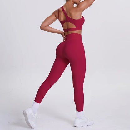 Yoga-Set Damen: bordeauxrotes Sport-BH mit Rückenausschnitt und Leggings