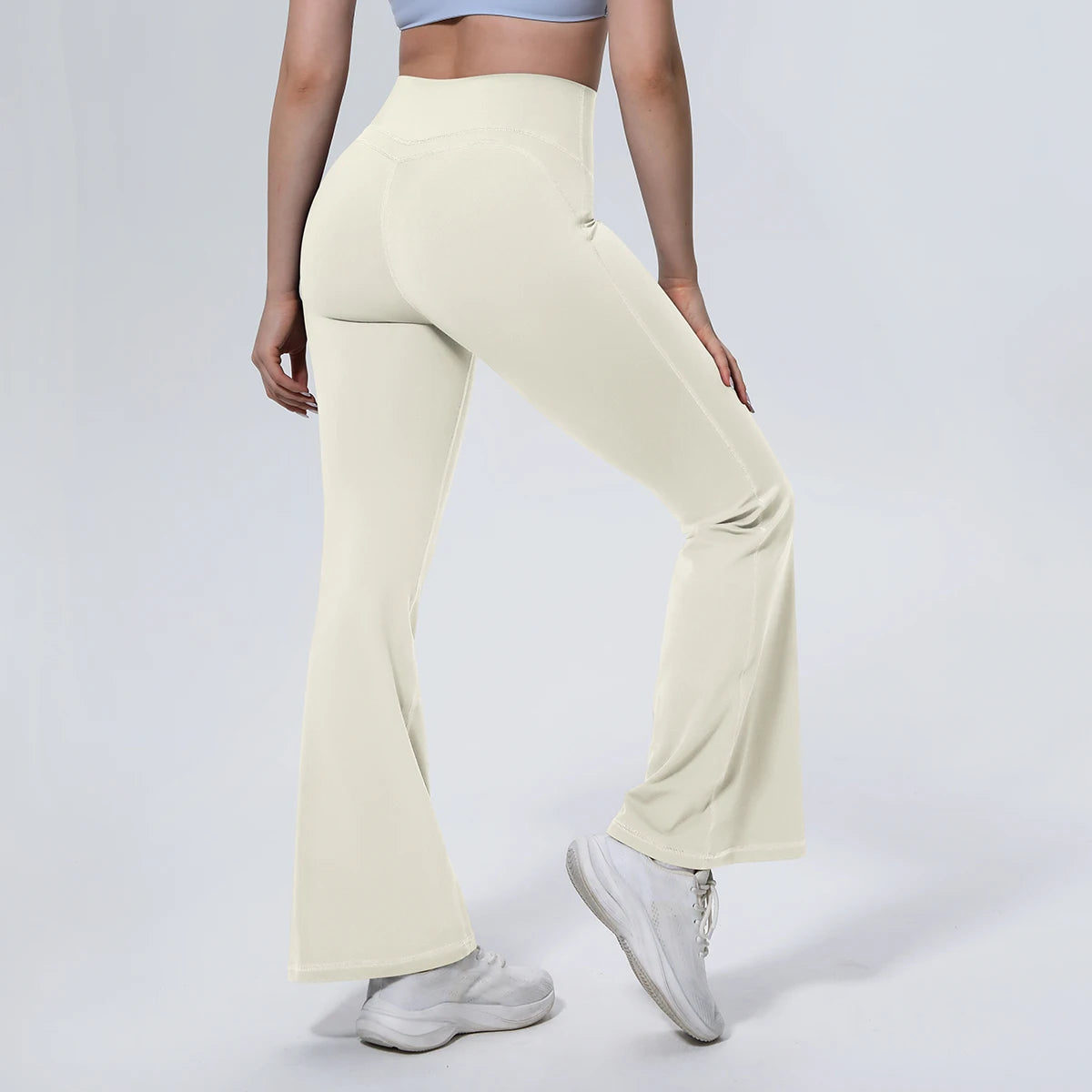 Damen-Yogahose mit hoher Taille, ausgestelltes Bein, hell cremefarben, Frontansicht