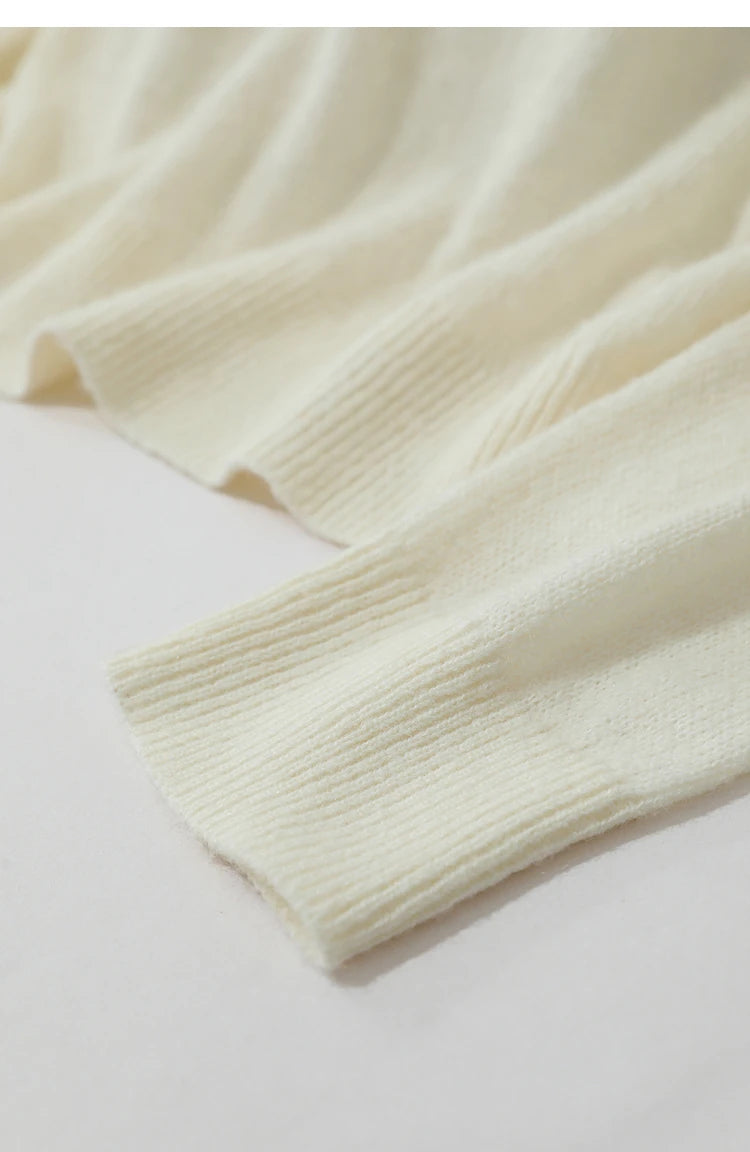 Damenpullover cremefarben: Ärmelbündchen und glatte Strickstruktur, lange Ärmel