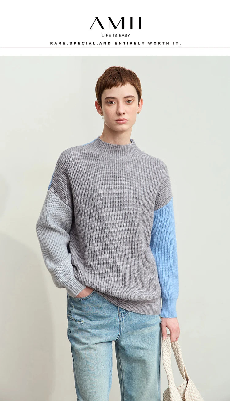 Strickpullover mit Stehkragen, grau meliert, hellblauer Farbakzent am Ärmel