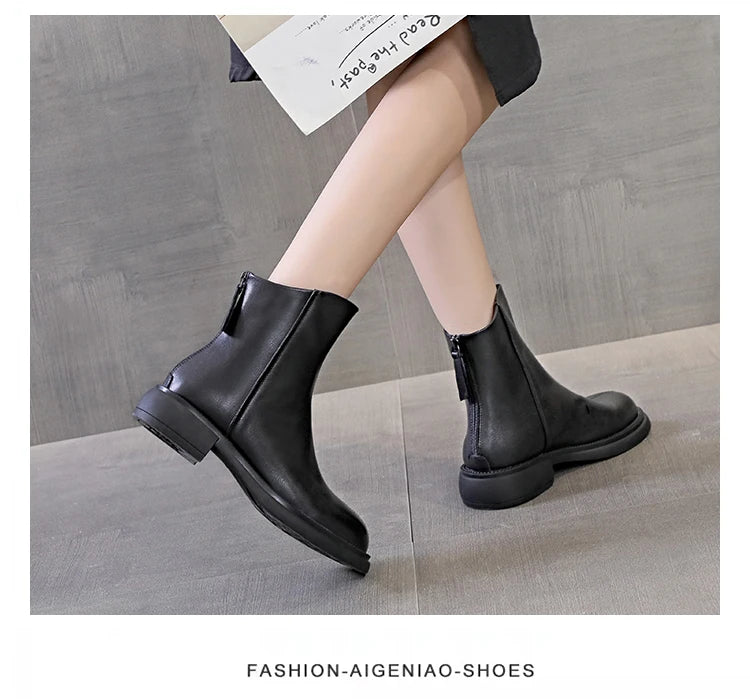 Damen-Lederstiefeletten in Schwarz, Knöchelboots mit flachem Absatz und seitlicher Naht
