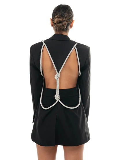 Elegantes Midi-Kleid mit Pailletten und Patchwork, schulterfrei und langärmelig – figurbetontes Design für Damen.