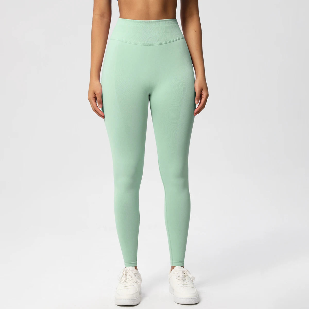 Nahtlose High-Stretch-Leggings mintgrün, glatte Frontansicht mit hohem Bund