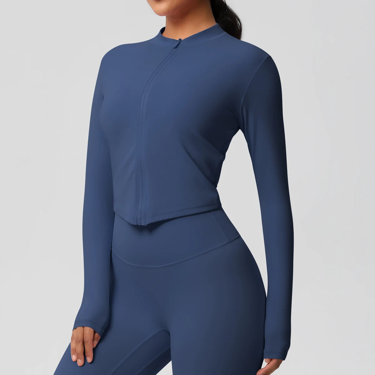 Langarm-Fitnessoberteil, Slim Fit, dunkelblau, Seitenansicht, durchgehender Reißverschluss