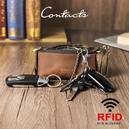 Leder-Schlüssel-Etui mit Reißverschluss und Schlüsselbund; RFID-Blockierungssymbol sichtbar