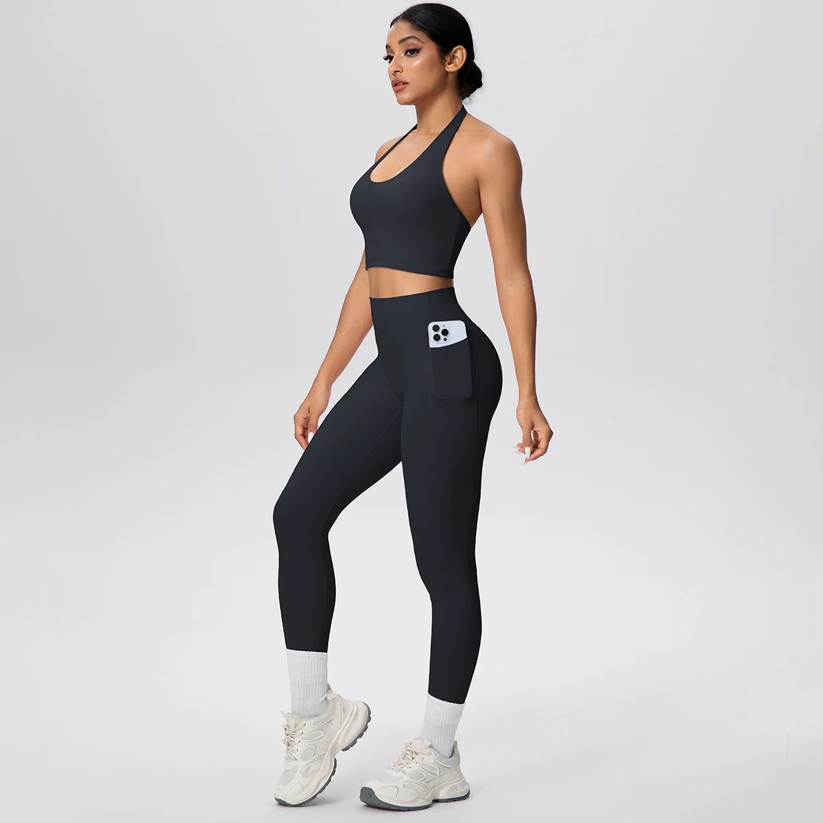 Schwarzes Yogaset für Frauen: Sport-BH und lange Leggings, Handyfach vorn