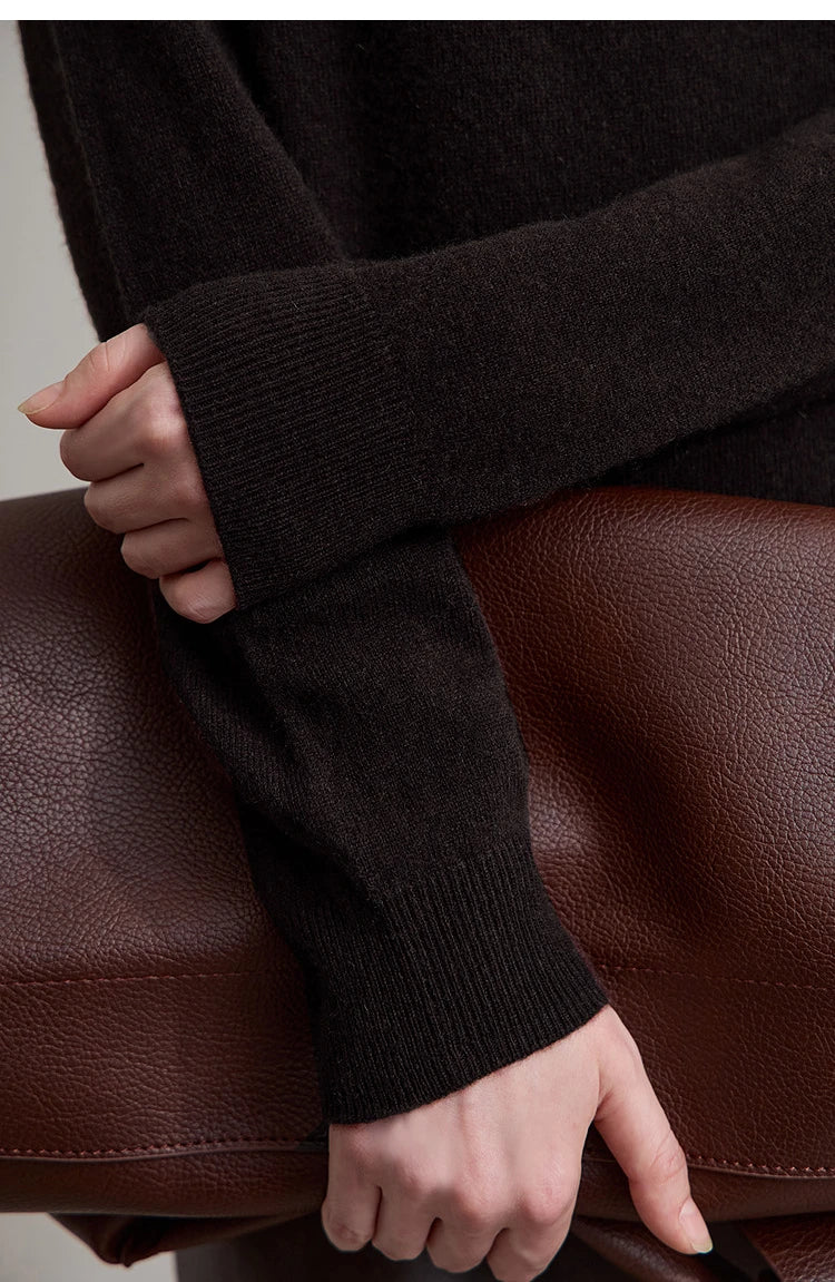 Damenpullover aus Wolle, schwarz, gerippte Bündchen und Ärmelabschluss
