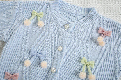 Mädchen Strickjacke in Candy-Farbe mit Bogen für den Herbst