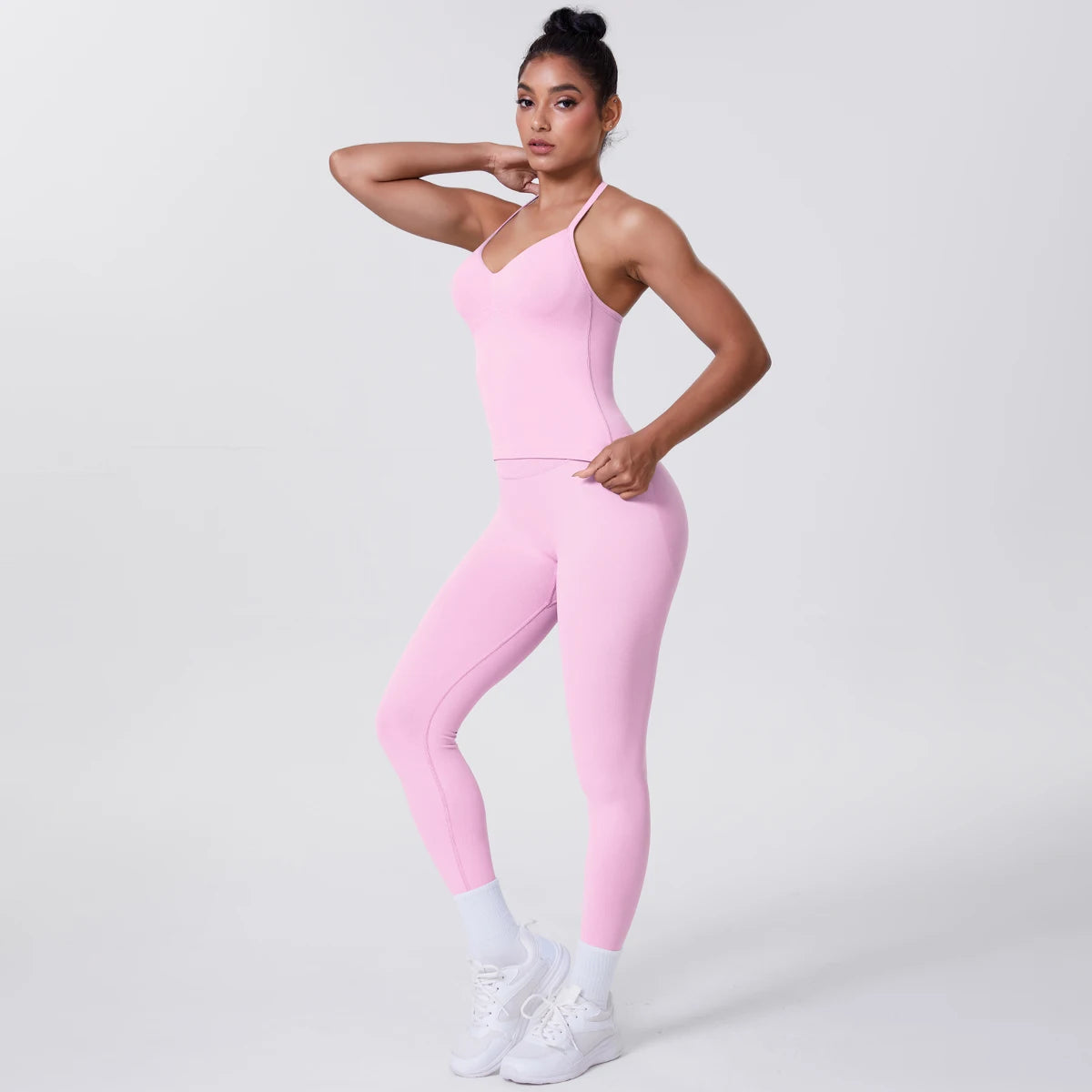 Rosa Damen-Yoga-Set, schmale Passform: Träger-Top und Leggings im Stand