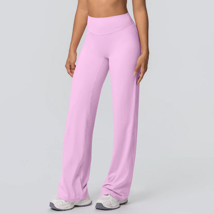 Weite Yoga-Hose in hellem Rosa, Vorderansicht mit langem, weitem Bein und glatter Oberfläche.