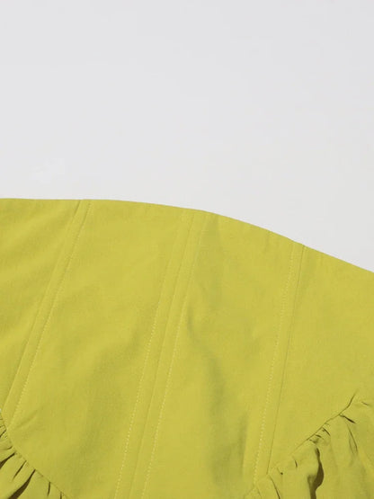 Eleganter A-Linien-Rock mit hohem Bund und Patchwork-Design für Damen – minimalistischer Stil mit Punktmuster.