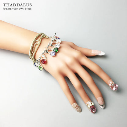 Sterlingsilber-Armband mit mehreren farbigen Schmuckanhängern und Steindetails