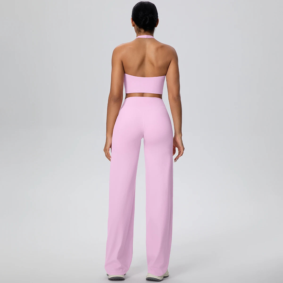 Yoga-Set für Frauen: Sport-BH und weite Hose, rosé/lila, Rückansicht mit ganzer Länge