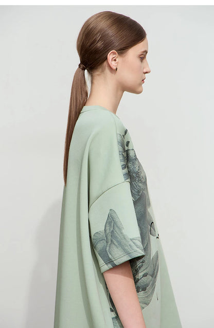 Damen T-Shirt mit lockerem O-Ausschnitt und Blumenmuster sowie Stickerei