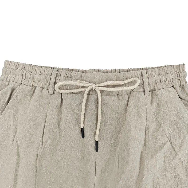 Graue Herren-Fitness-Shorts für Sommer und Training – Bequeme, elastische Dreipunkt-Hose für Laufen und Freizeit
